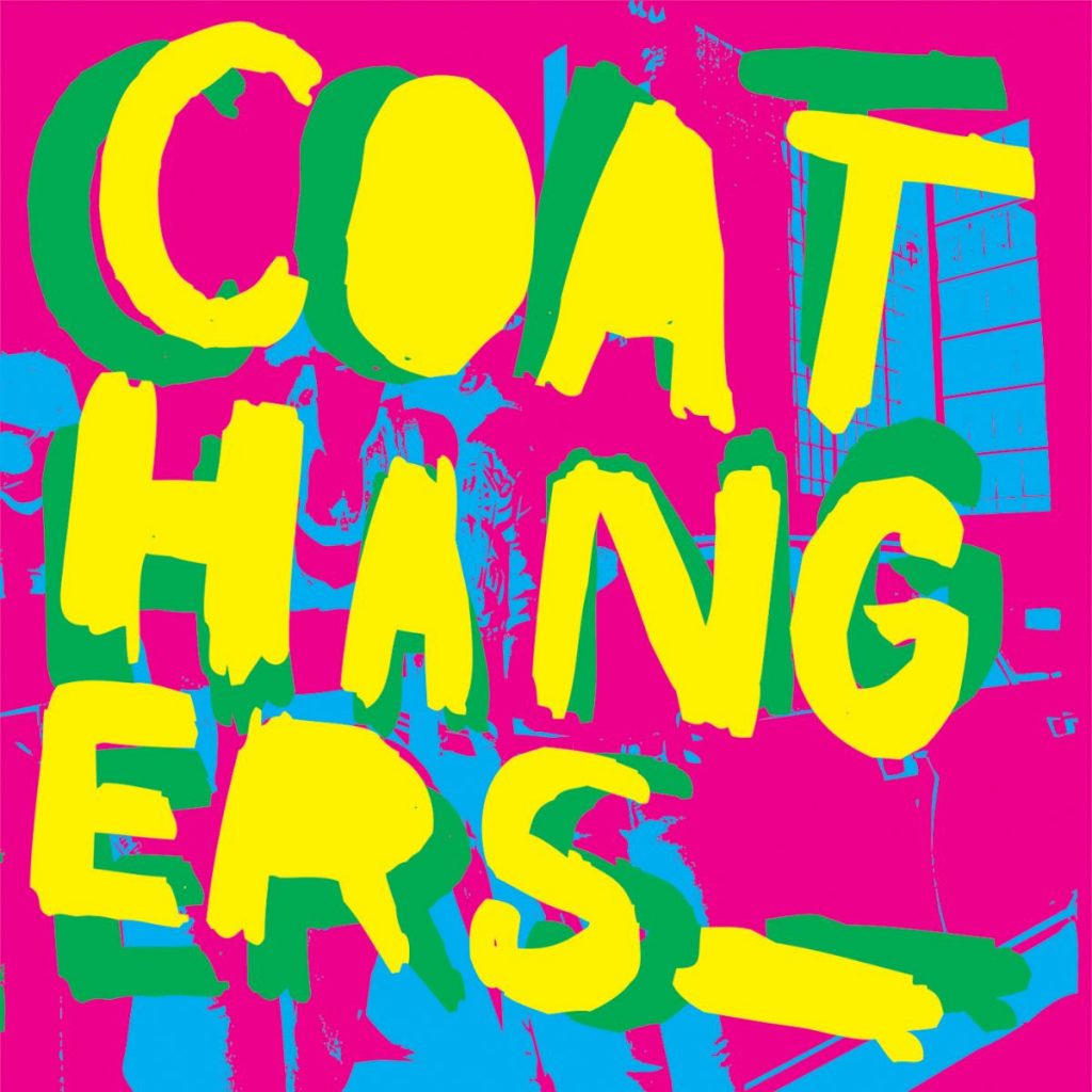 the coathangers nestle in my boobies